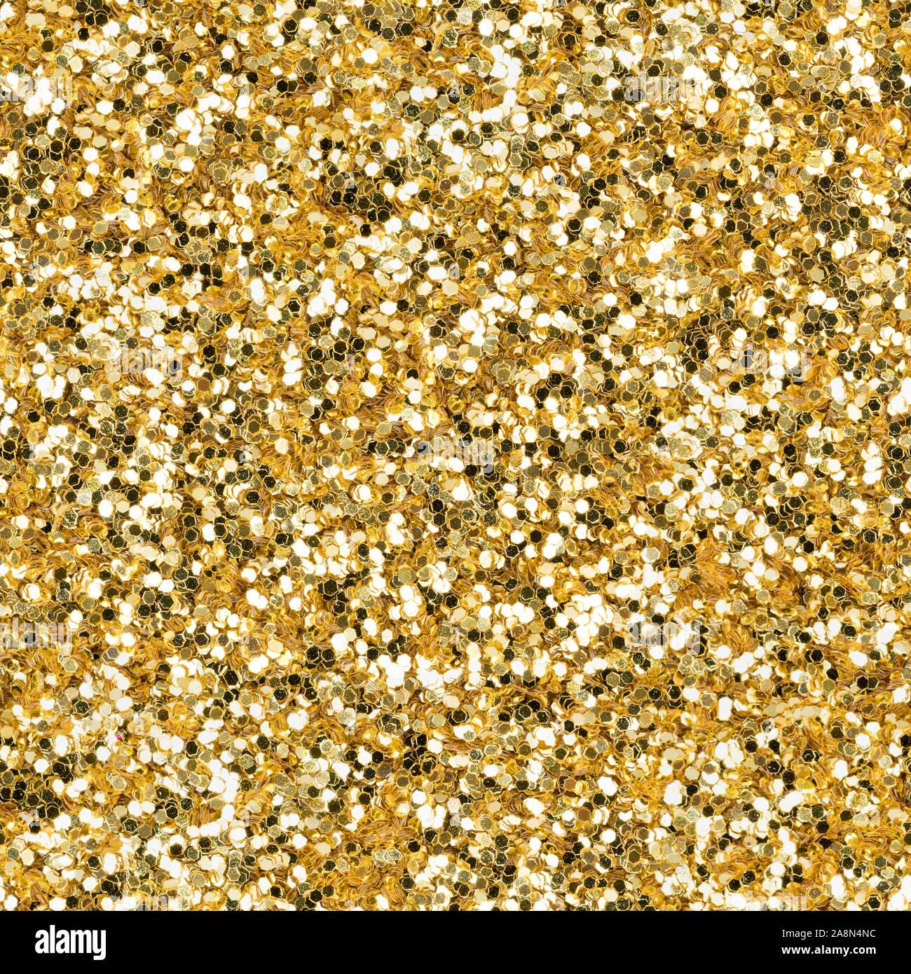 Golden glitter, sparkle confetti texture. Christmas abstract background