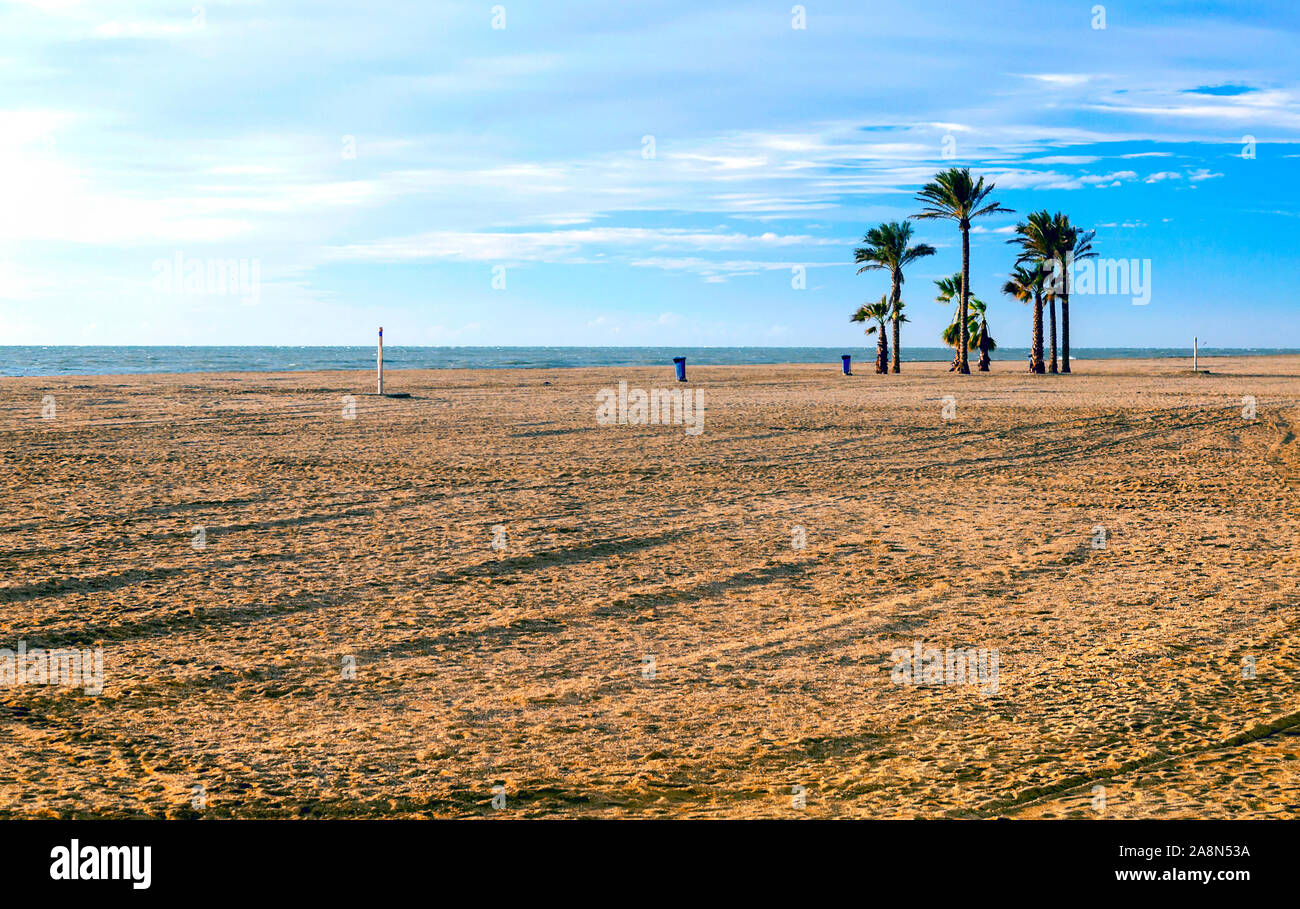Roquetas beach in the Spanish province of Almeria on a cloudy day. It is a tourist and holiday place. Stock Photo