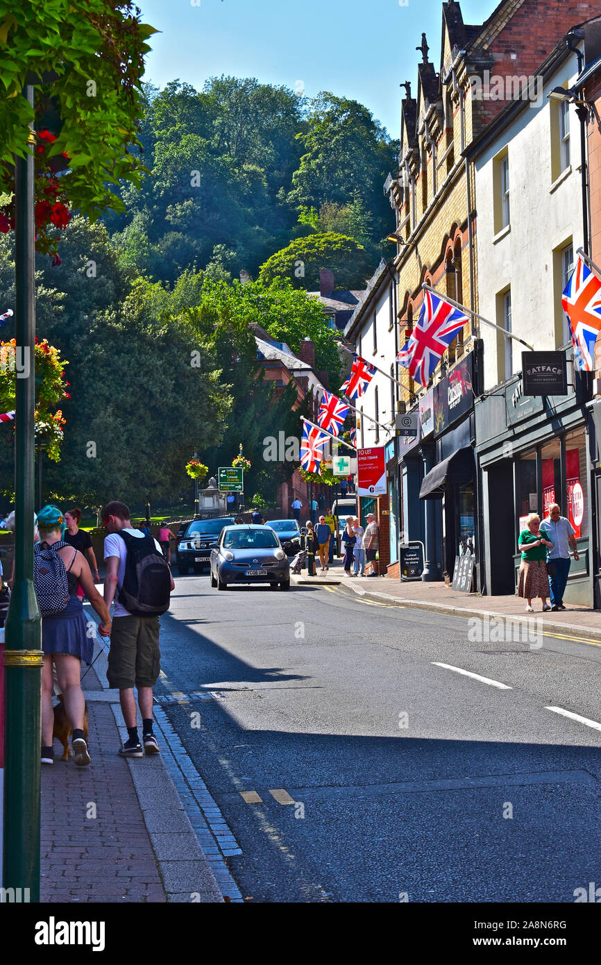 A view of the town centre shops on Church Street looking up the hill