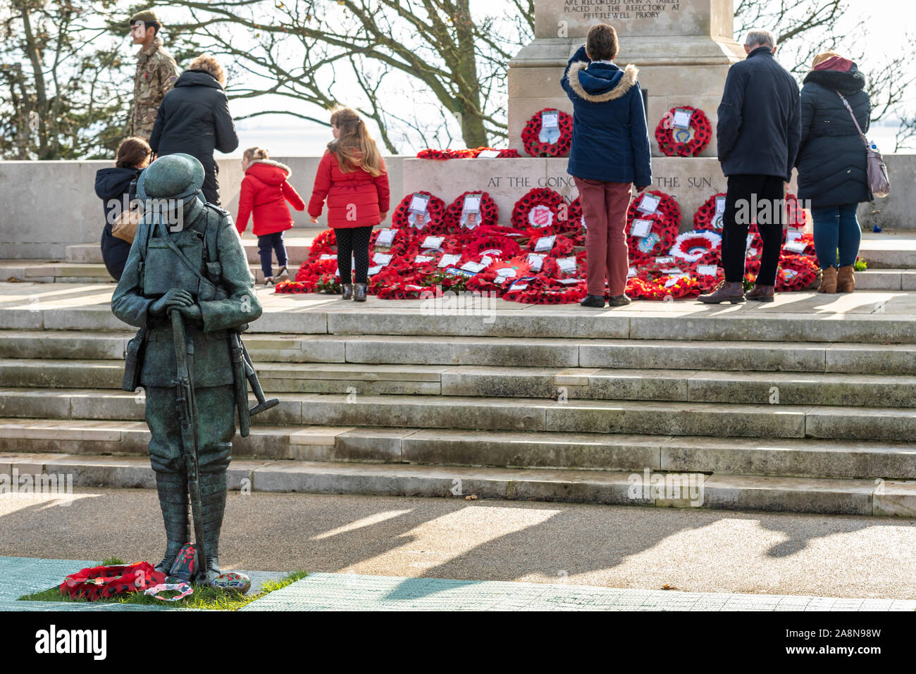 A remembrance day service was held at the Lutyens designed Southend Cenotaph war memorial high above the Thames Estuary. A new life size bronze statue of a WWI British ‘Tommy’ has been added in front of the cenotaph Stock Photo