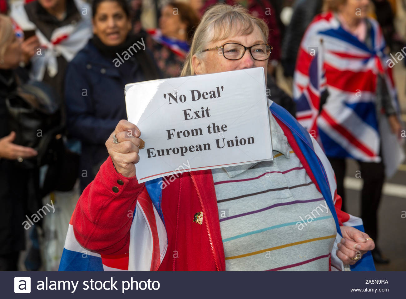 London, UK. 31st Oct, 2019. A woman holds up a sign at A Leave means Leave march at Westminster, held to protest the failure to deliver Brexit. Stock Photo