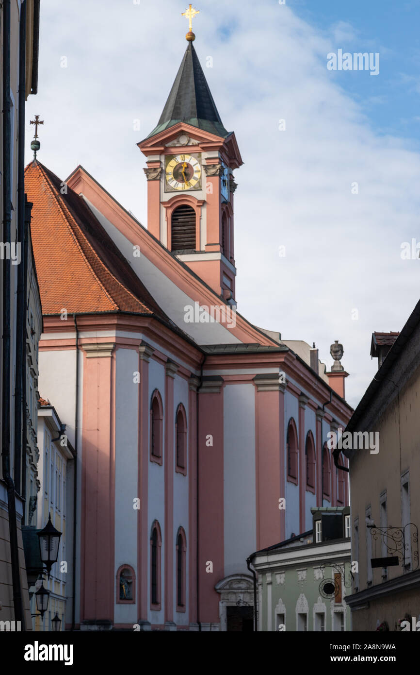 The Tower Of Church Saint Paul In Passau Bavaria Germany With Green Trees In Foreground Stock