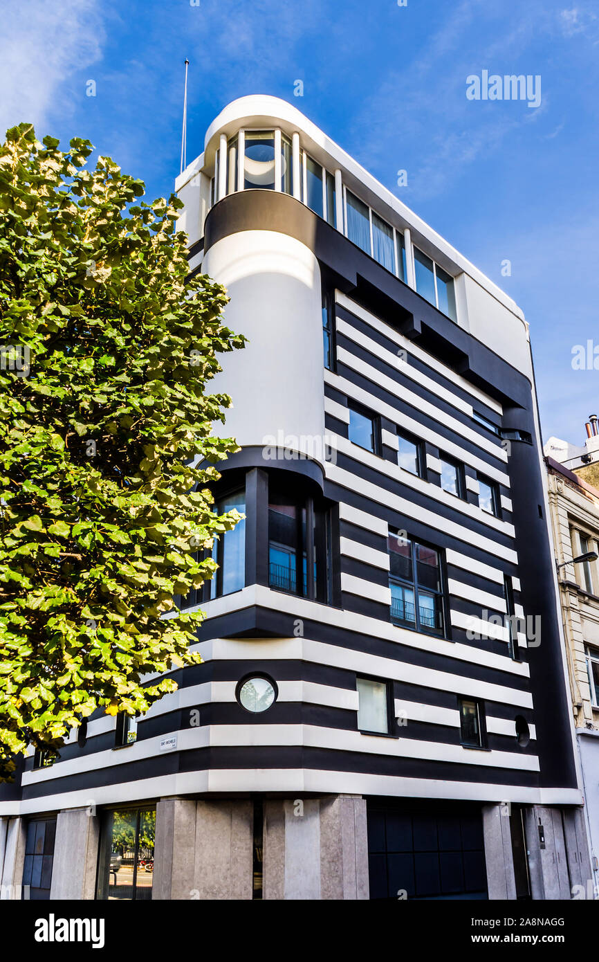 Modern black and white building facing the Scheldt waterway - Antwerp, Belgium. Stock Photo