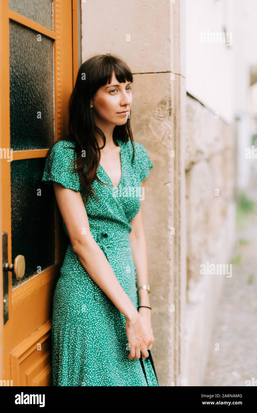 woman wearing an elegant green dress is waiting for somebody Stock Photo - Alamy woman wearing an elegant green dress is waiting for somebody Stock Photo - Alamy
