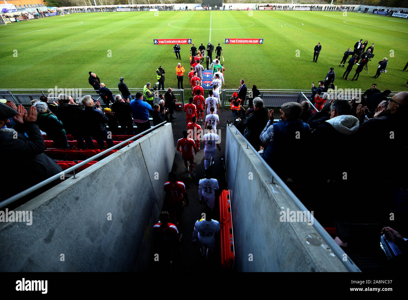 General view of players walking out before the FA Cup First Round match at the SKYEx Community Stadium, London. Stock Photo