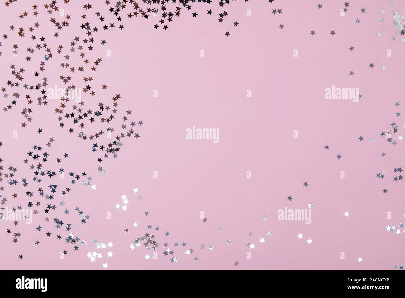 Festive backdrop with star shaped confetti Stock Photo