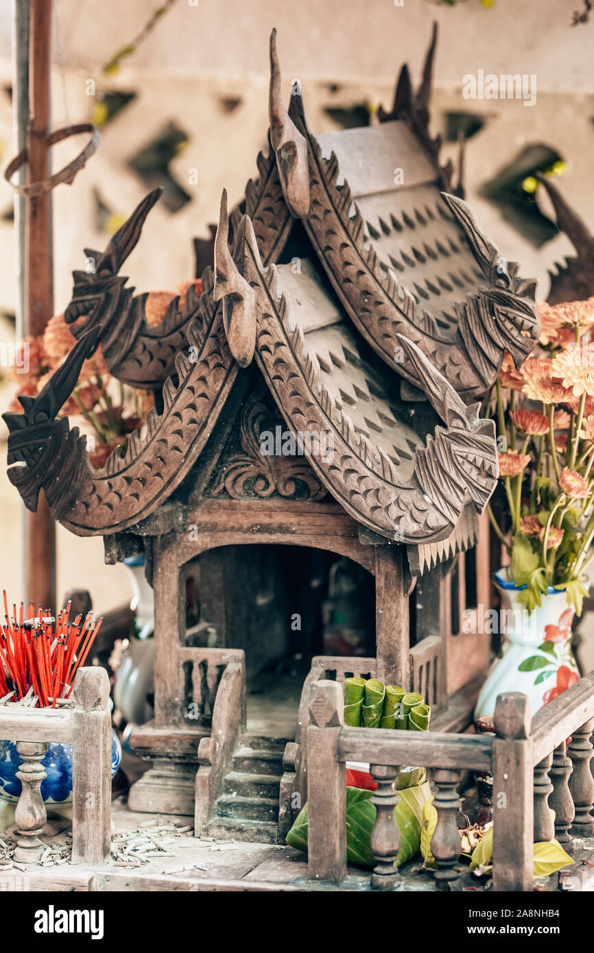 Wooden carved spirit house in Thailand  Stock Photo