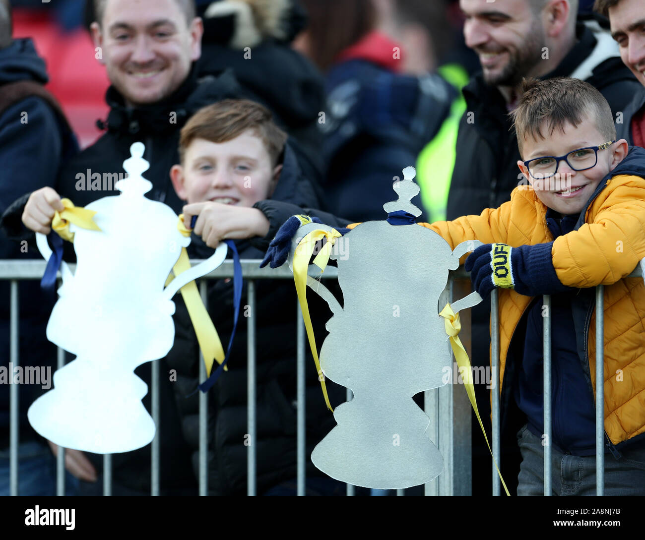 Oxford United fans during the FA Cup First Round match at the SKYEx Community Stadium, London. Stock Photo