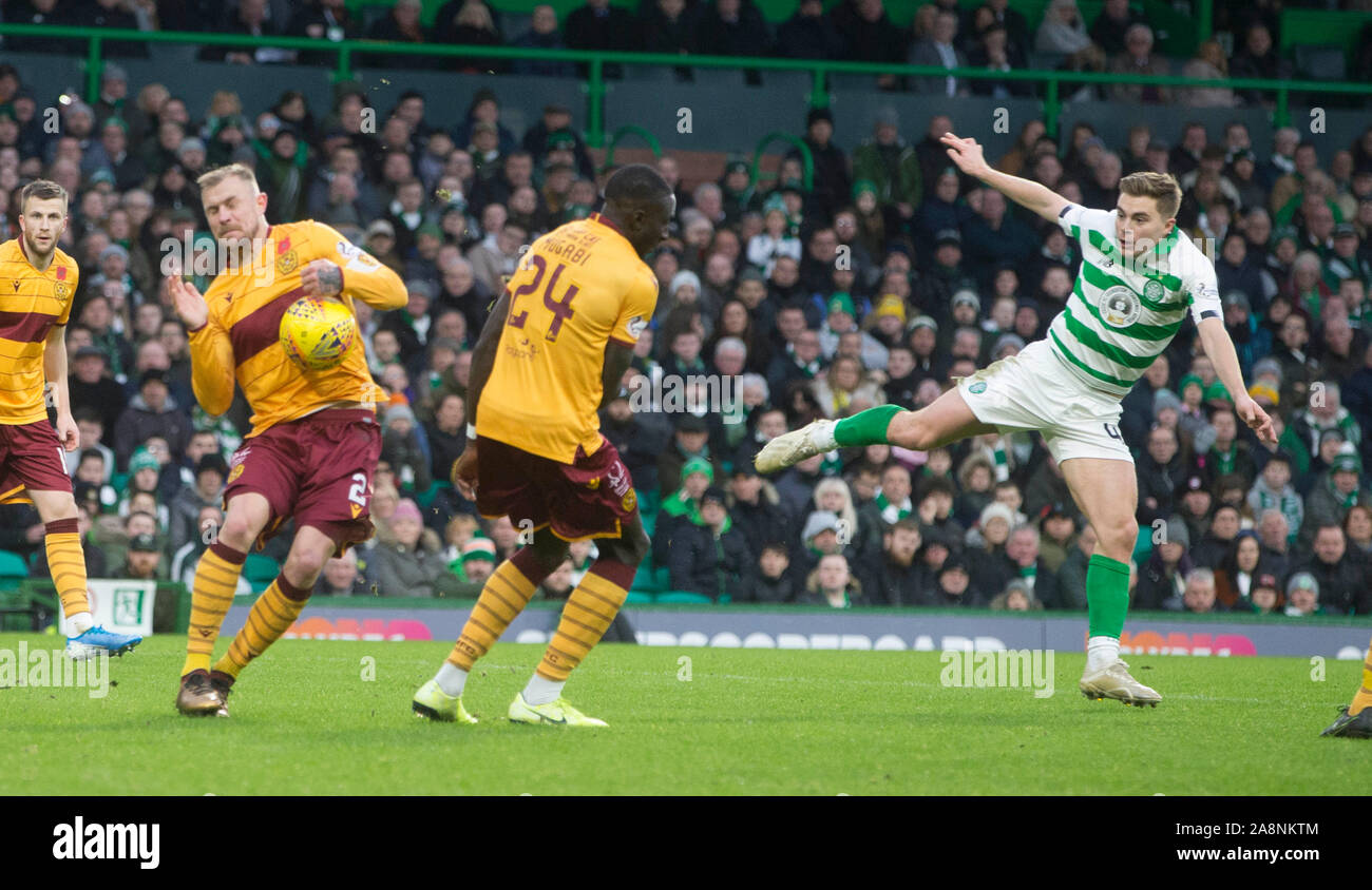 Celtic’s James Forrest shot comes off the arm of Motherwell player Richard Tait during the Ladbrokes Scottish Premiership match at Celtic Park, Glasgow. Stock Photo