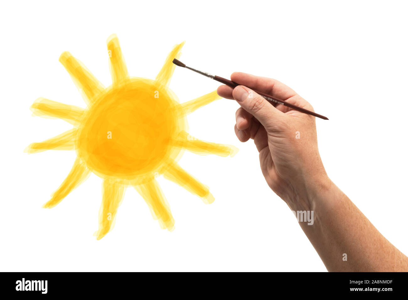hand with brush drawing a sun on paper Stock Photo Alamy