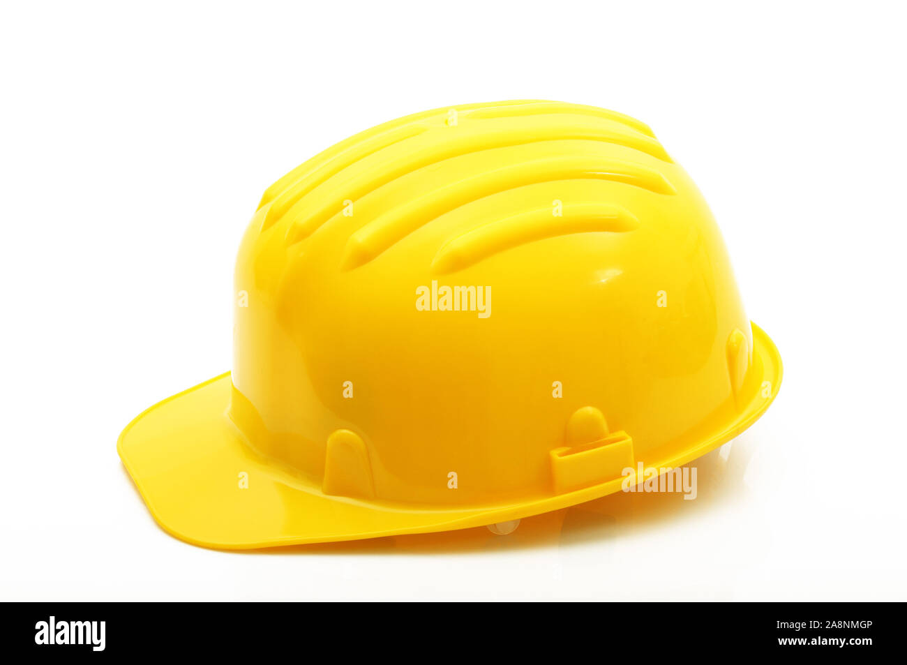 yellow classic safety helmet on white background Stock Photo Alamy