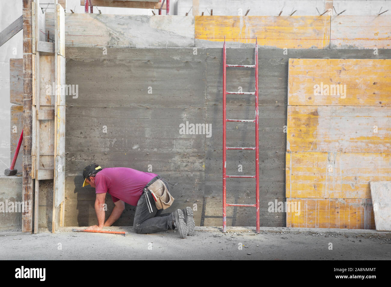 a Worker working in a construction site Stock Photo - Alamy