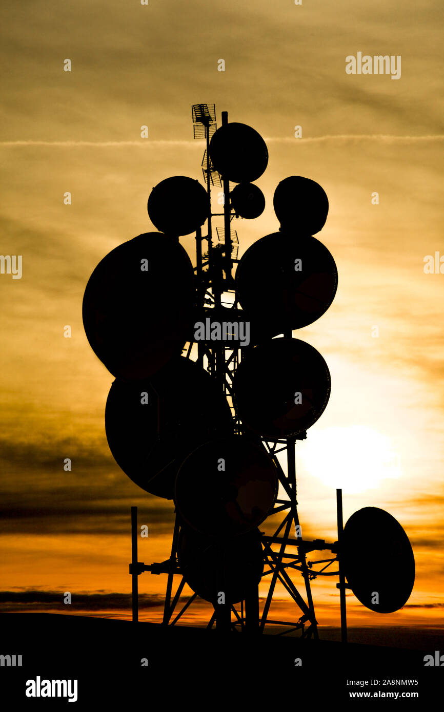 a Group of antennas for digital transmissions at sunset Stock Photo Alamy