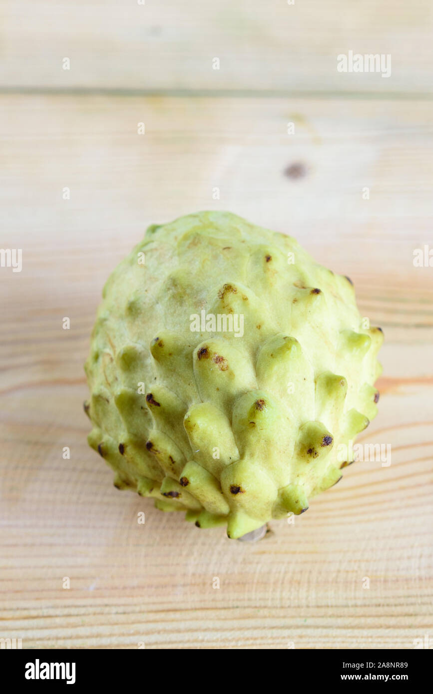 Annona, Custard Apple, Cherimoya, Sugar Apple on Wood Table Background