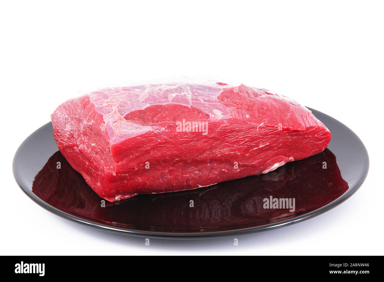Raw beef meat on white background Stock Photo - Alamy