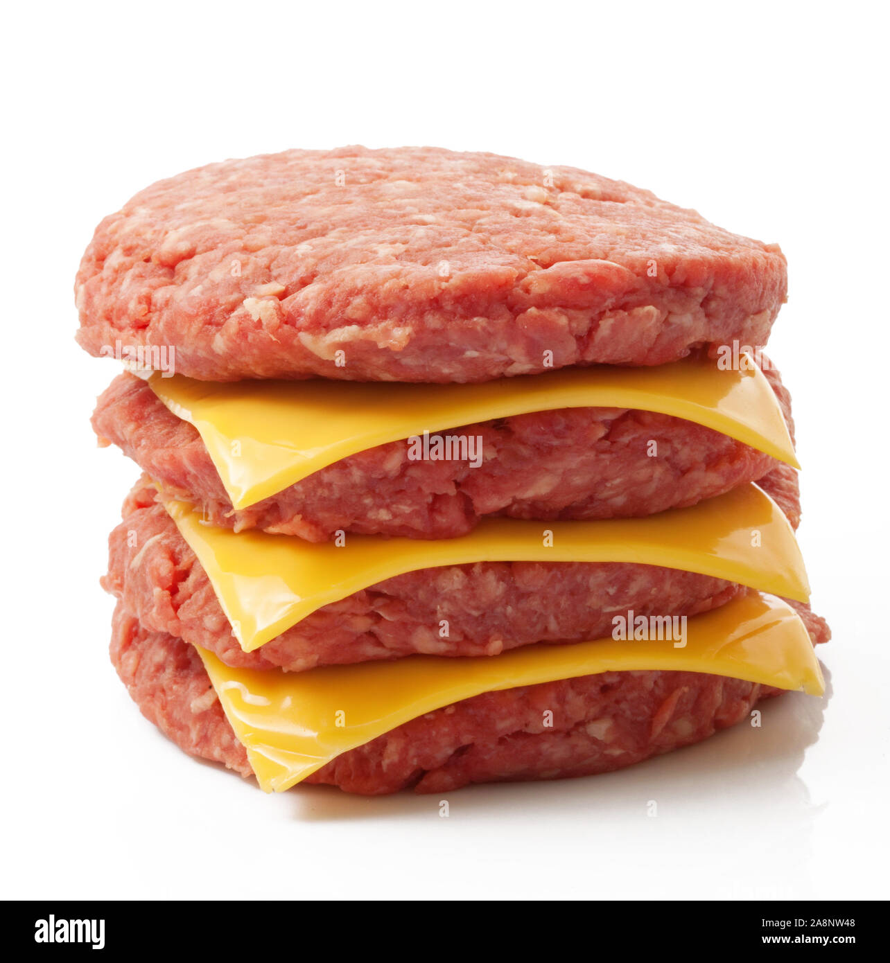 Raw hamburger ready to be cooked Stock Photo Alamy