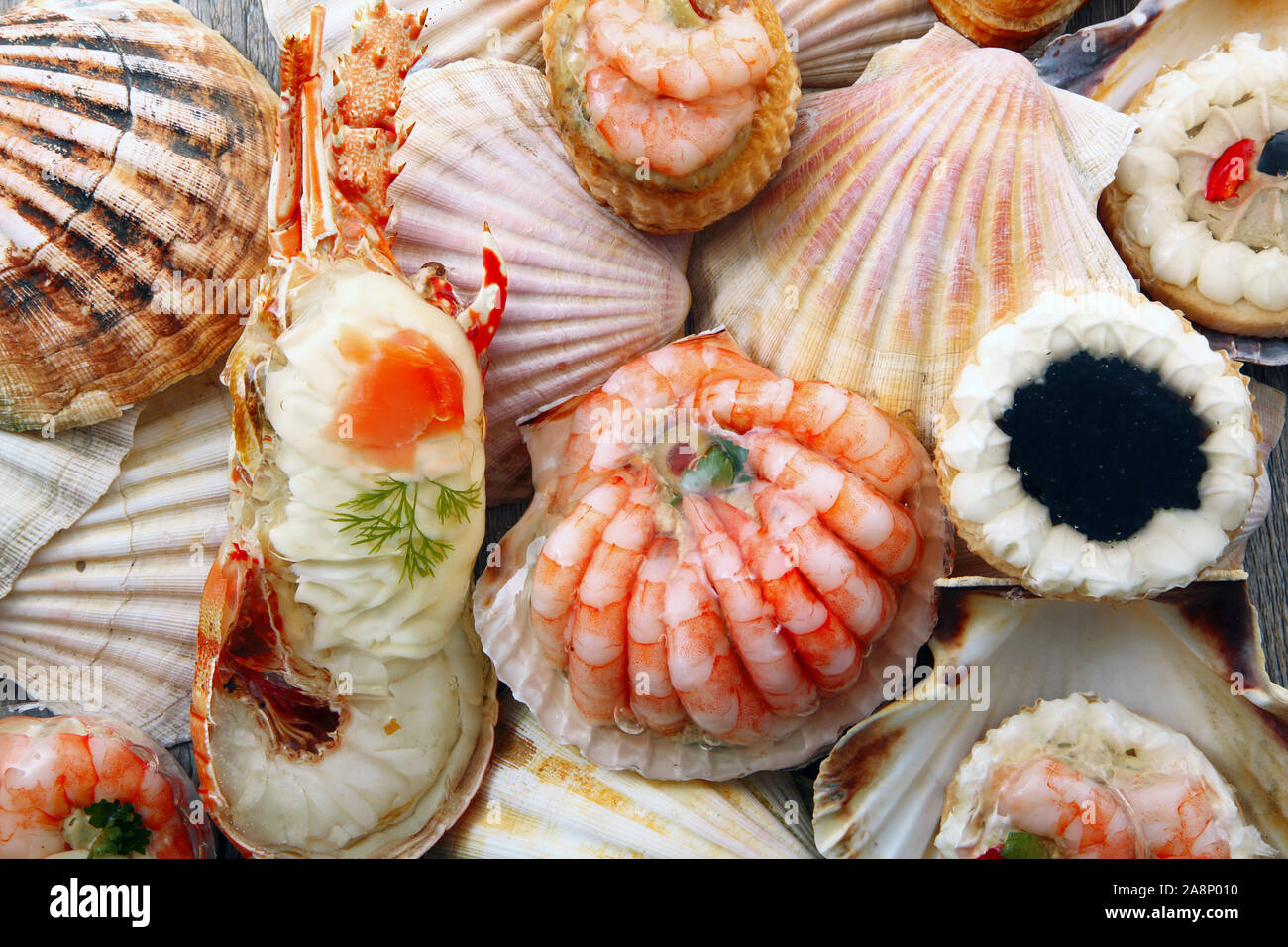 Delicious fresh specialties shellfish hi-res stock photography and ...