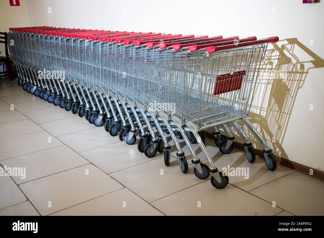 Carts lined up together. Lots of shopping carts. Stock Photo