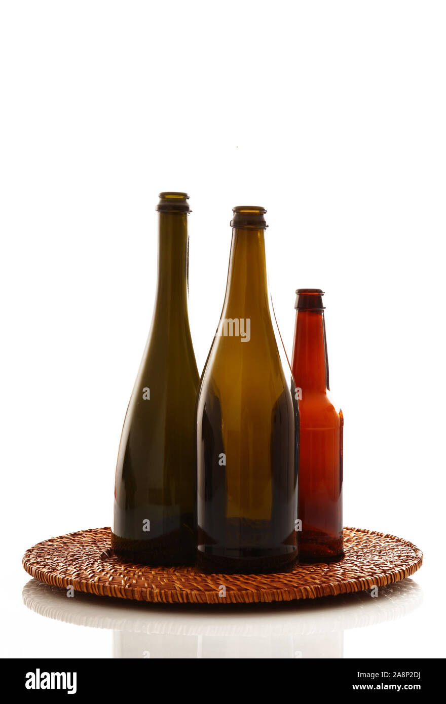 some old glass bottles on a white background Stock Photo - Alamy