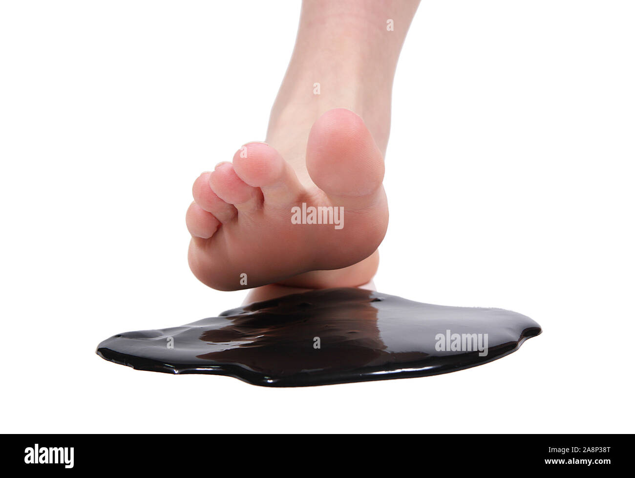 Foot crushing stain of tar on white background Stock Photo Alamy