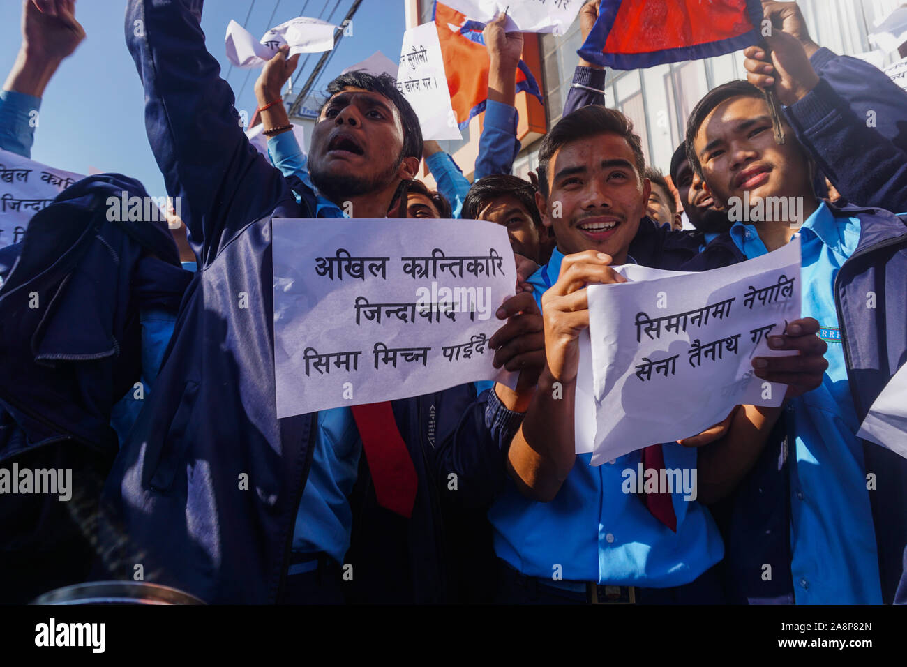 Nepalese students chant slogans while holding placards during an anti-India protest.Hundreds of Nepalese including students, gathered to protest against new India political map released which includes the Nepals land Kalapani and Lipulek as part of the Indian Territory. Stock Photo