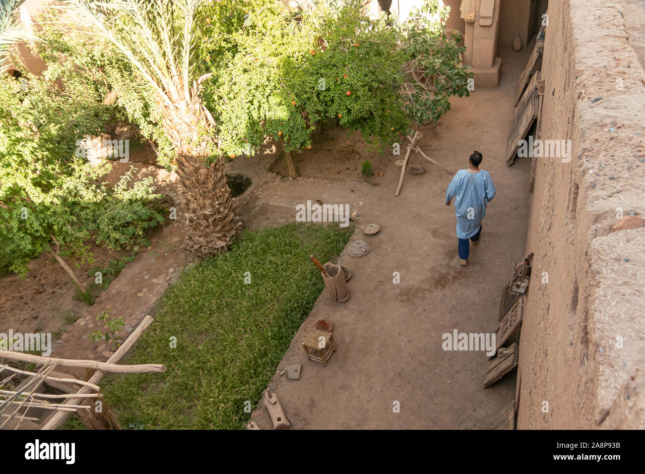 Arab man walking through the Kasbah Amridil, Ouled Yaacoub, Skoura.Morocco. Stock Photo
