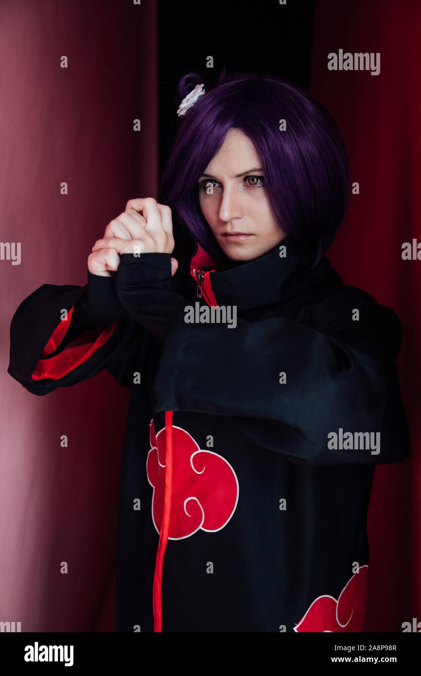 Woman Anime Cosplayer With Purple Japan Hair Stock Photo
