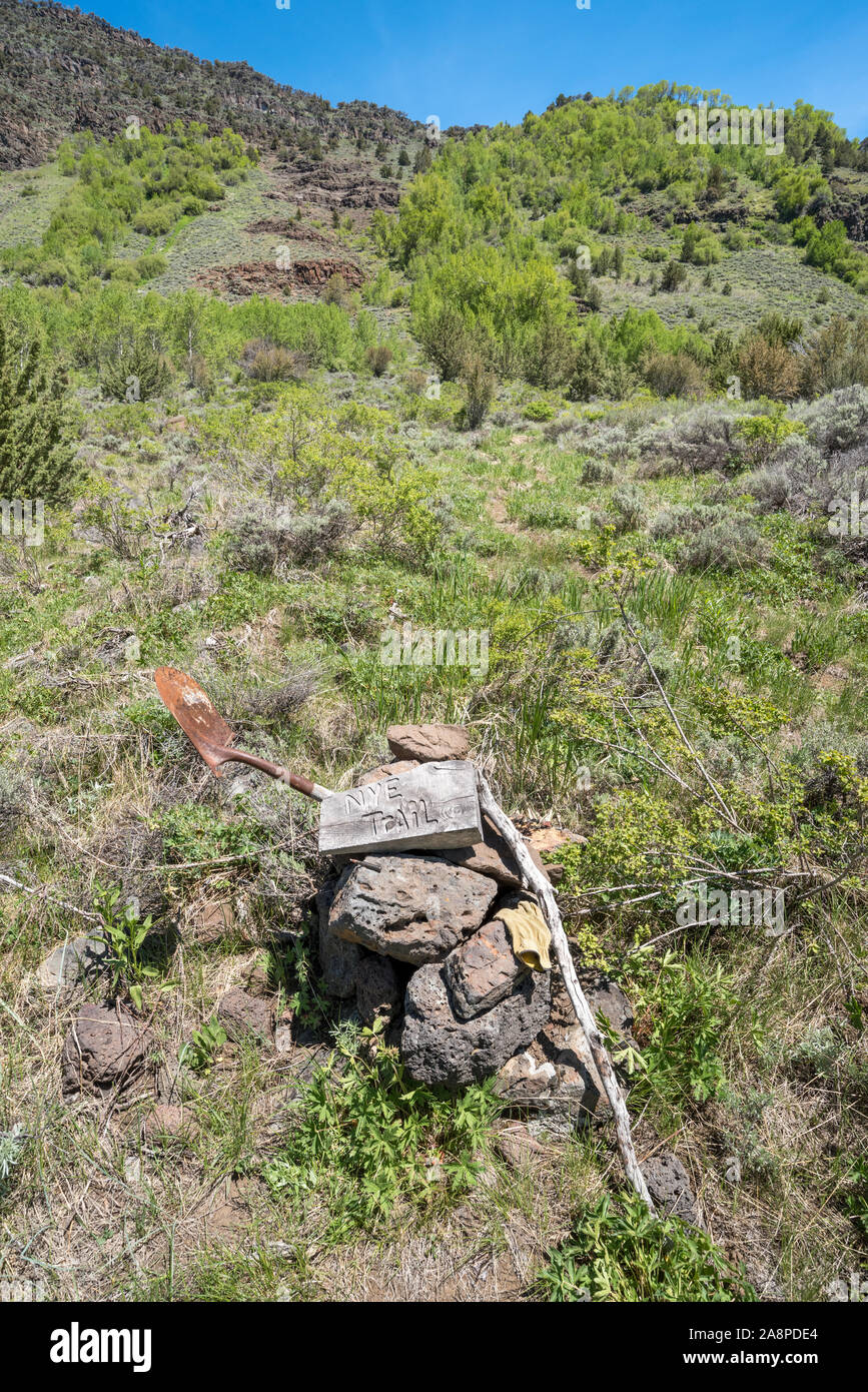 Cairn and shovel at base of the Nye Trail in Little Blitzen Gorge, Steens Mountain, Oregon. Stock Photo