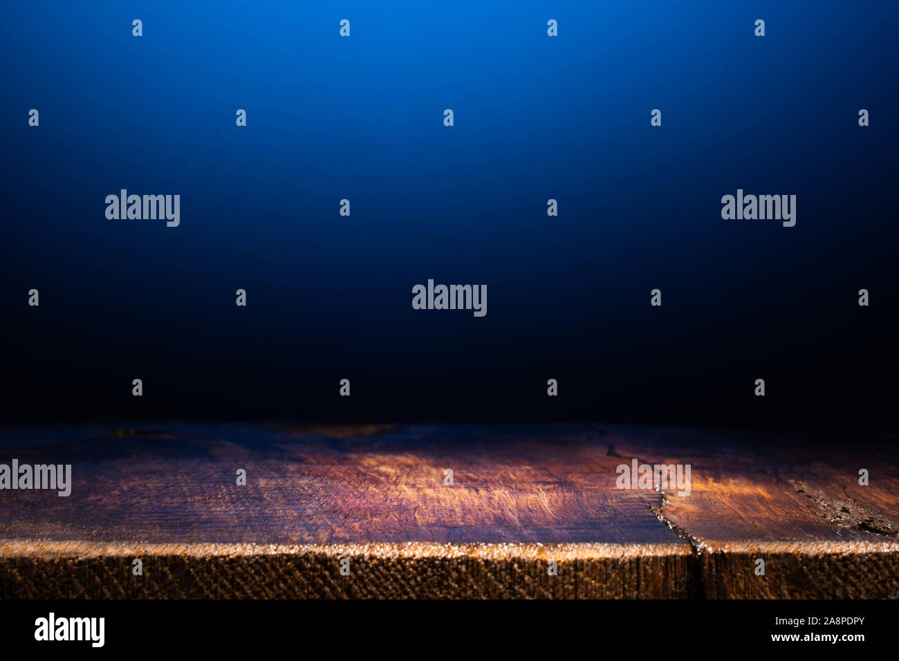 Empty Blue Back Table Empty Wooden Table on Dark Blue Background. Backdrop for Product ...