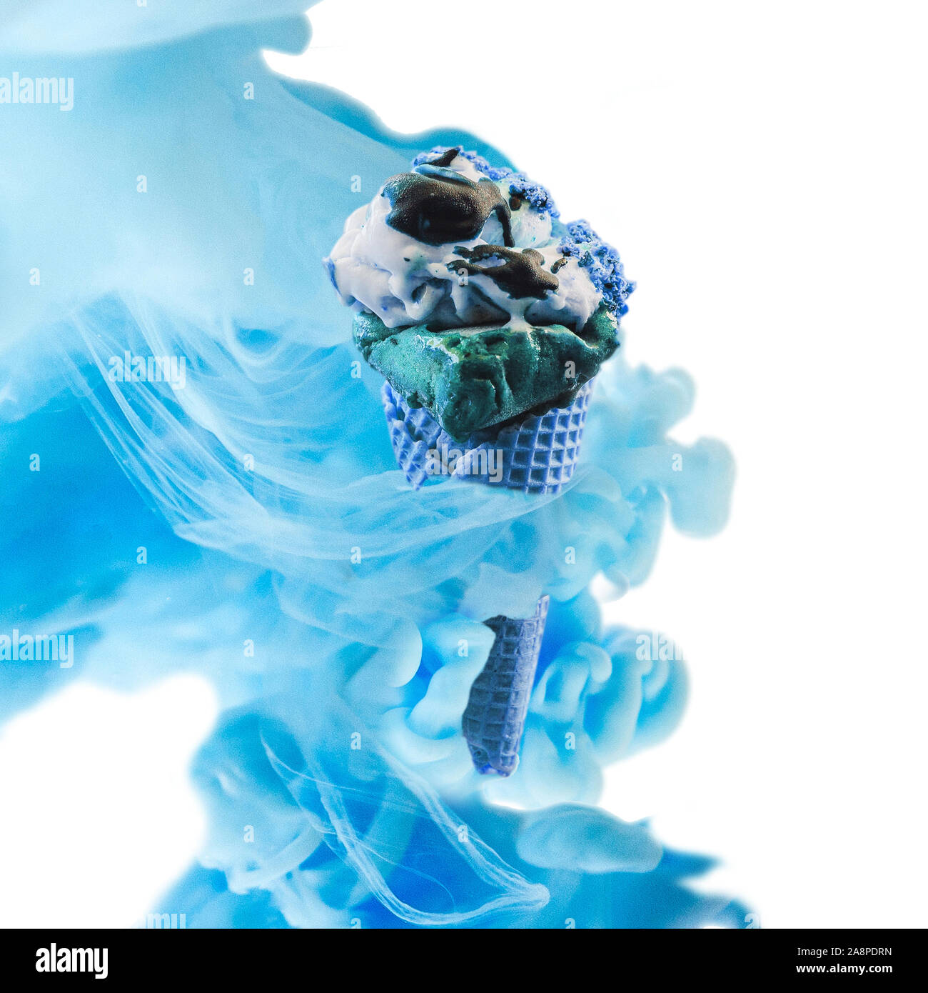 Creative ice cream with zero gravity. Ink in water style. Stock Photo