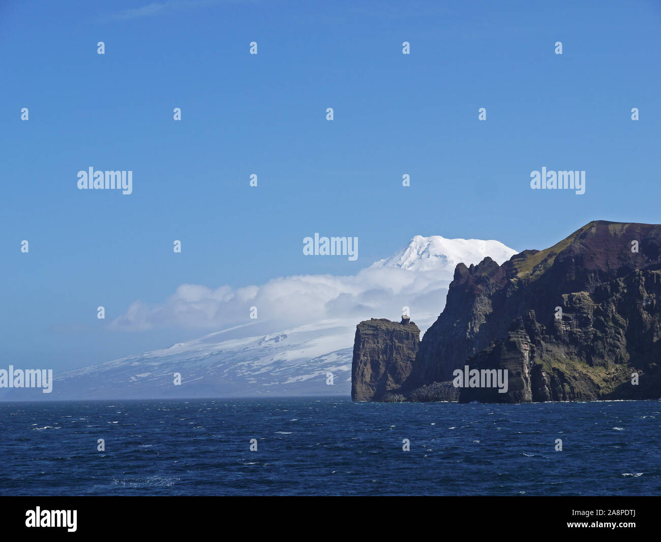 Jan Mayen Island a Norwegian volcanic island in the Arctic Ocean.  The island is dominated by the Beerenberg mountain and a Norwegian weather station. Stock Photo