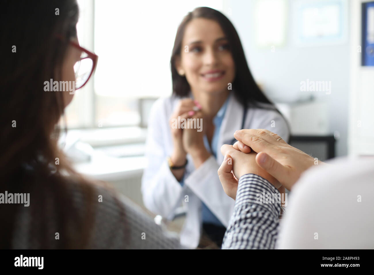 Patients visiting doctor Stock Photo