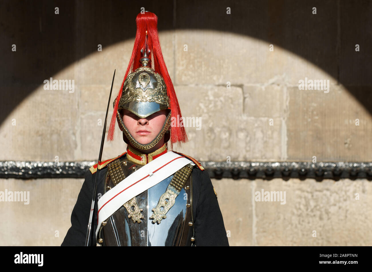 LONDON - OCTOBER 14, 2011: Dismounted sentry at Horse Guards Arch, Saint James's Palace, Whitehall, a tradition upheld since Tudor times. Stock Photo