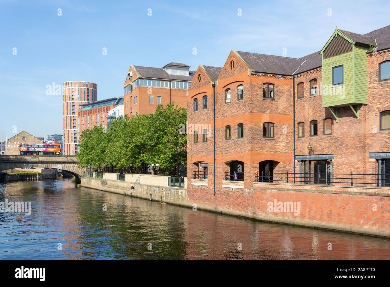 Victoria Bridge and warehouses across River Aire, Leeds, West Yorkshire, England, United Kingdom Stock Photo