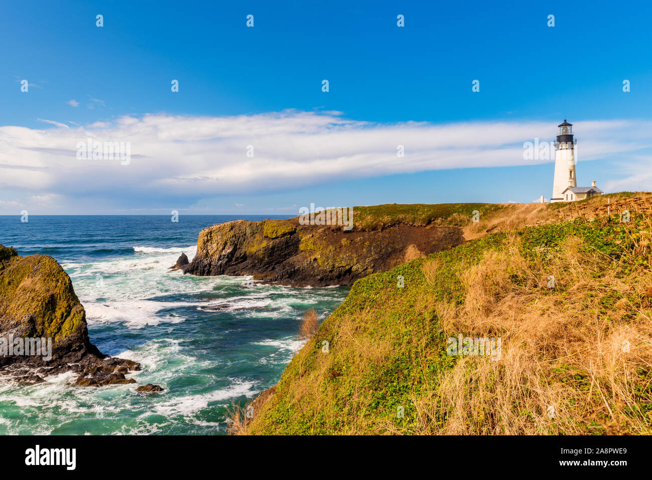 Yaquina Head Lighthouse along the Pacific Northwest coast in Newport, Oregon, USA Stock Photo