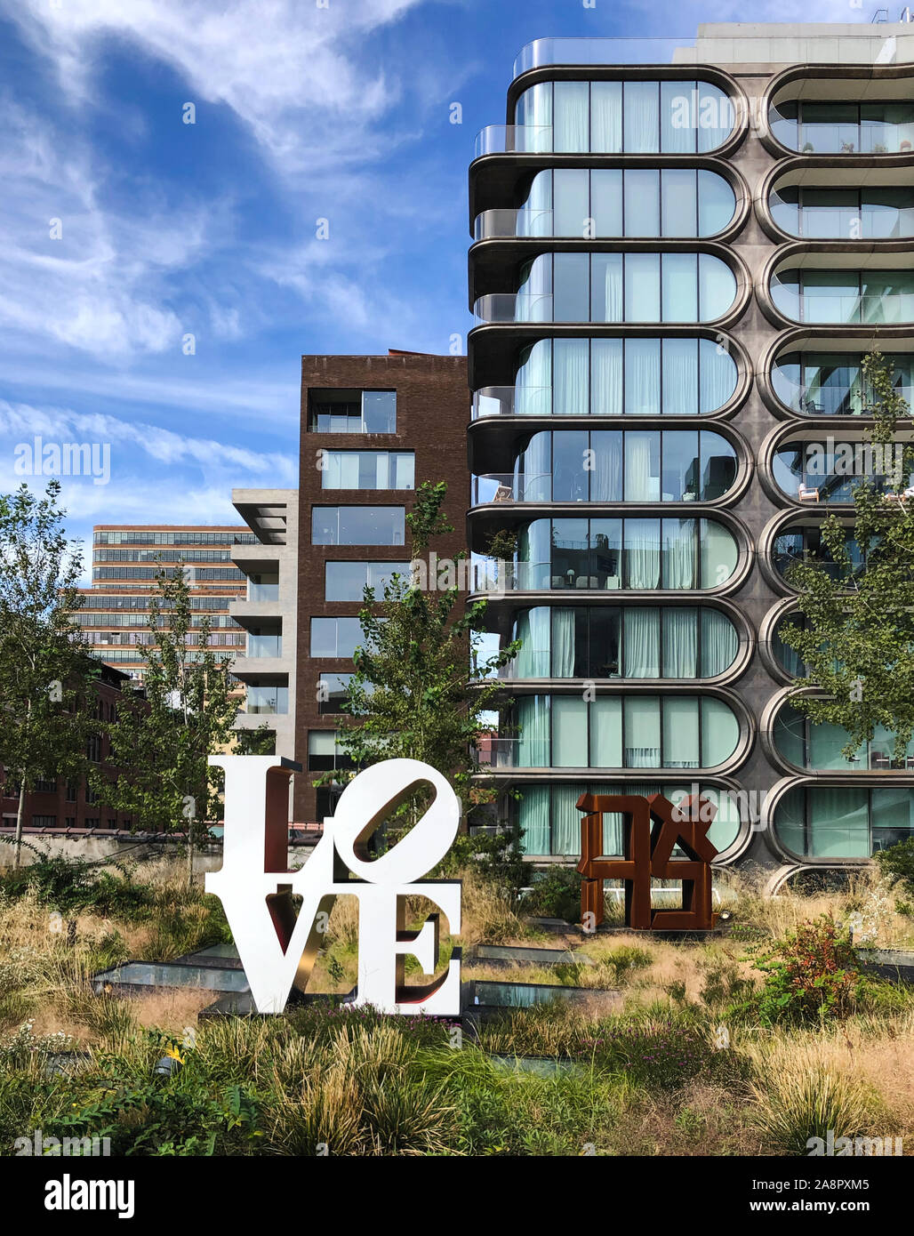 Modern building and Love sign in New York City, New York, USA. Stock Photo