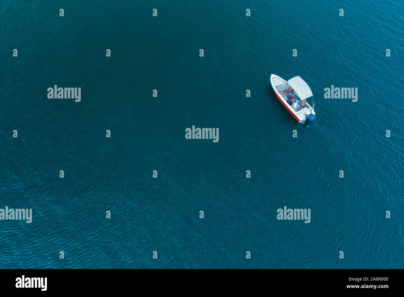 Aerial view of beautiful blue sea water at hot summer day and sailing ...