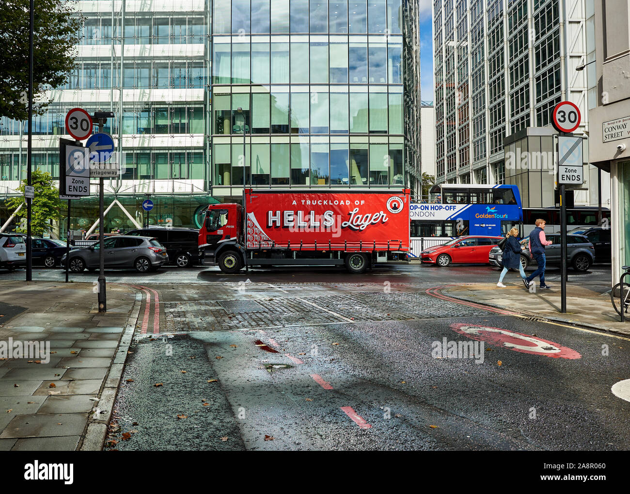 A Camden Hells Lager delivery lorry waiting in traffic in London. Stock Photo