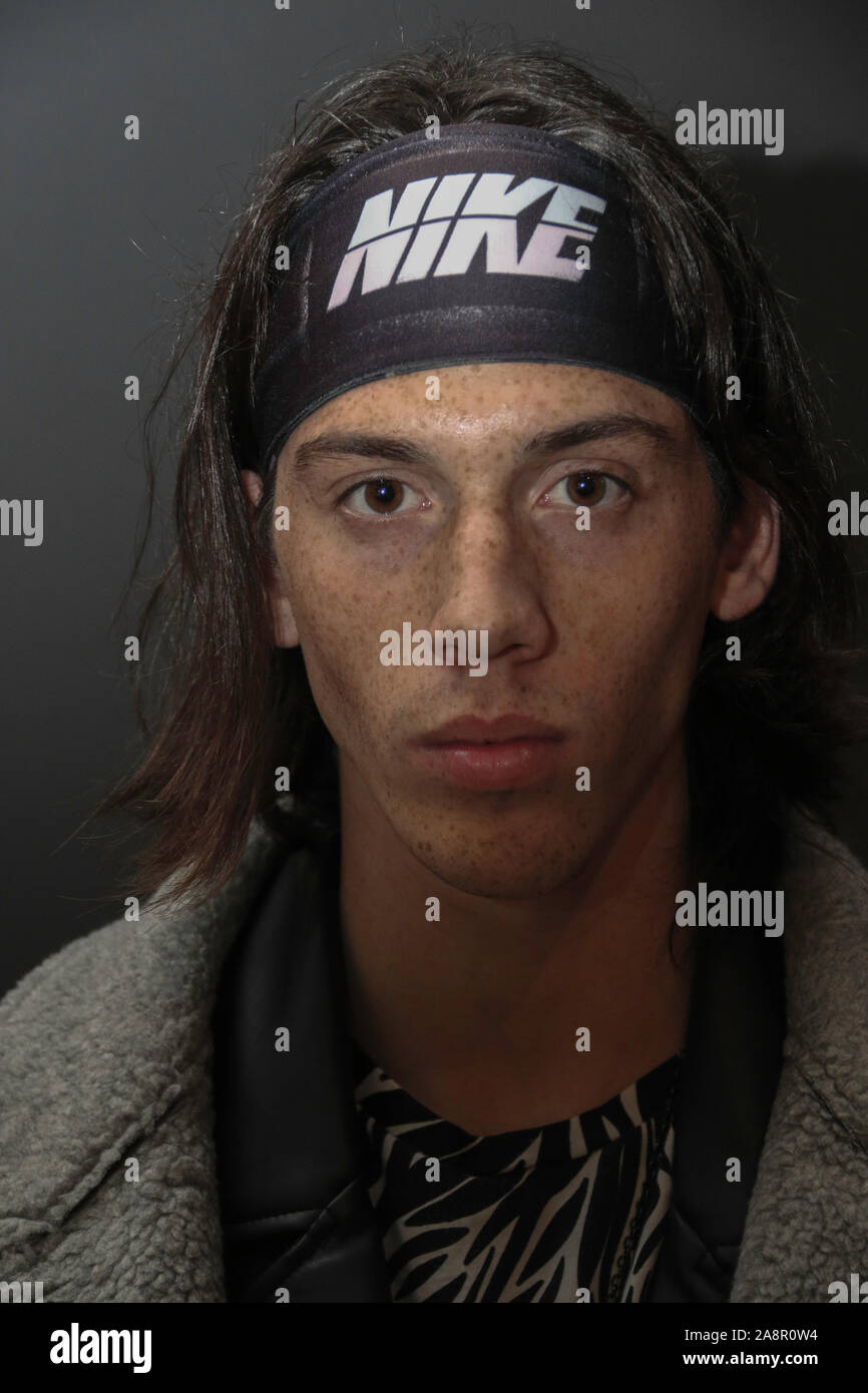 BUDAPEST CENTRAL EUROPEAN FASHION WEEK - NOV 10, 2019 - Kati Zoob designer  - model - freckled boy face with NIKE headband Stock Photo - Alamy