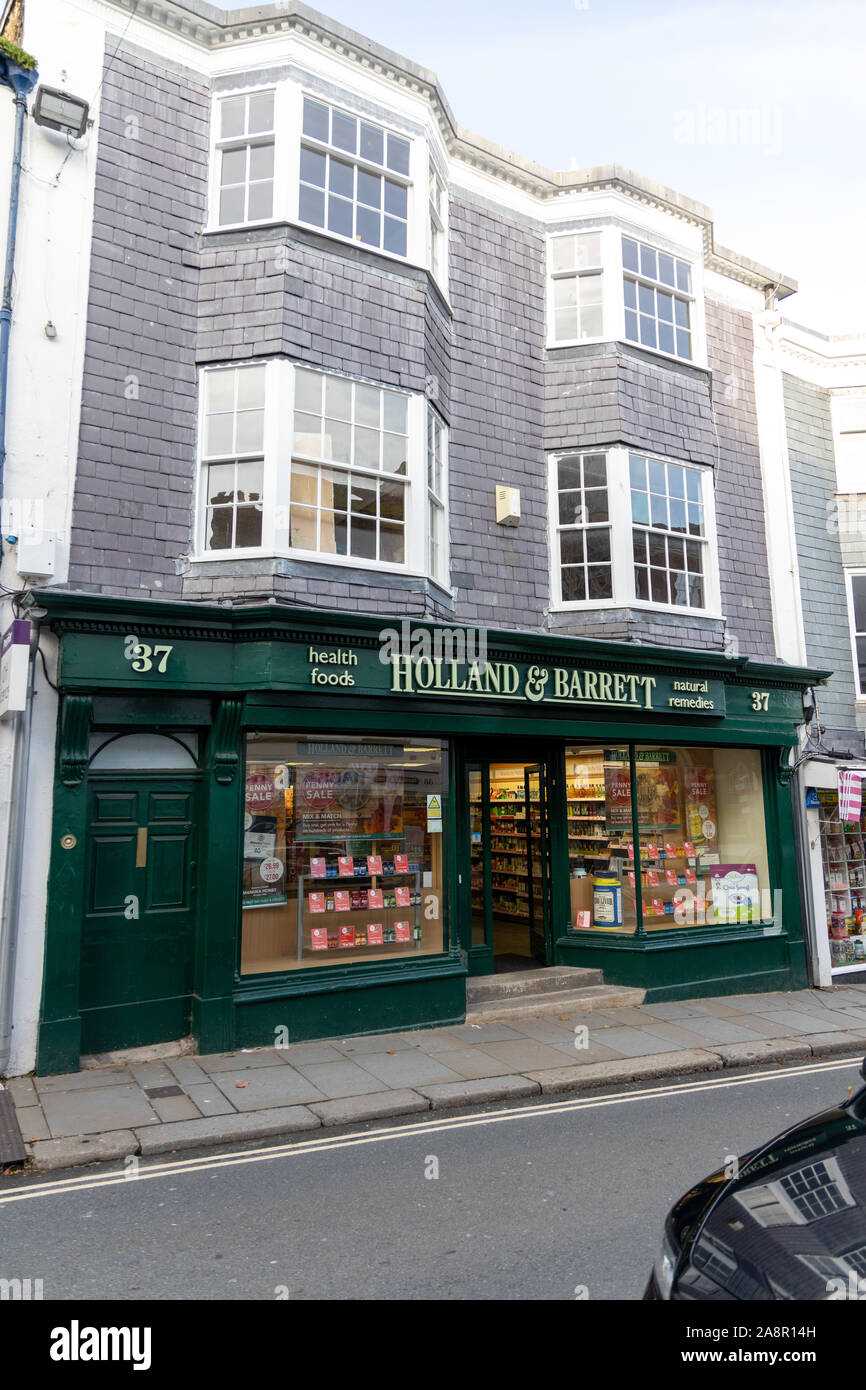 Holland & Barrett store front, High Street, Totnes, Devon Stock Photo