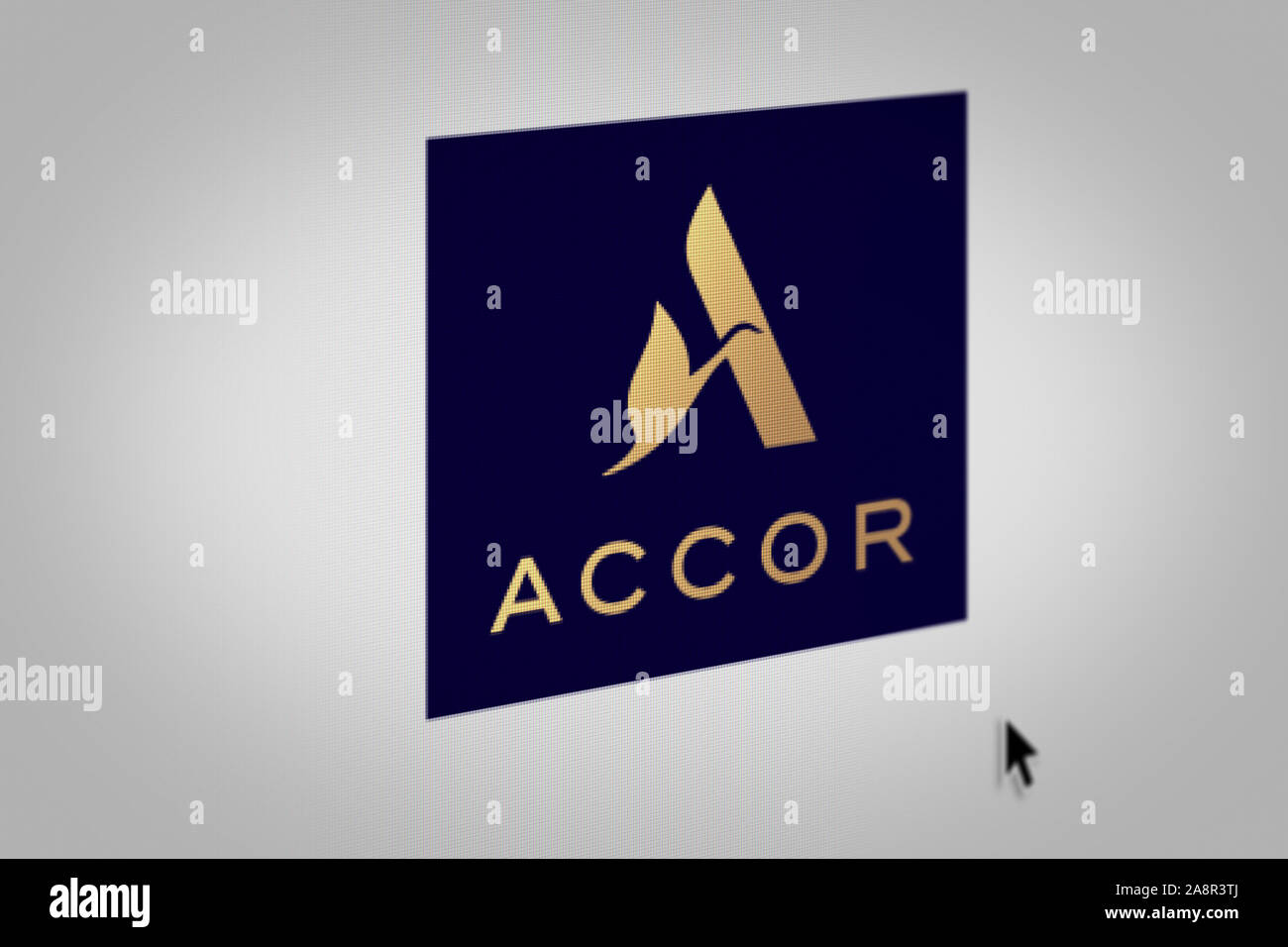 Logo of the public company Accor displayed on a computer screen in close-up. Credit: PIXDUCE Stock Photo