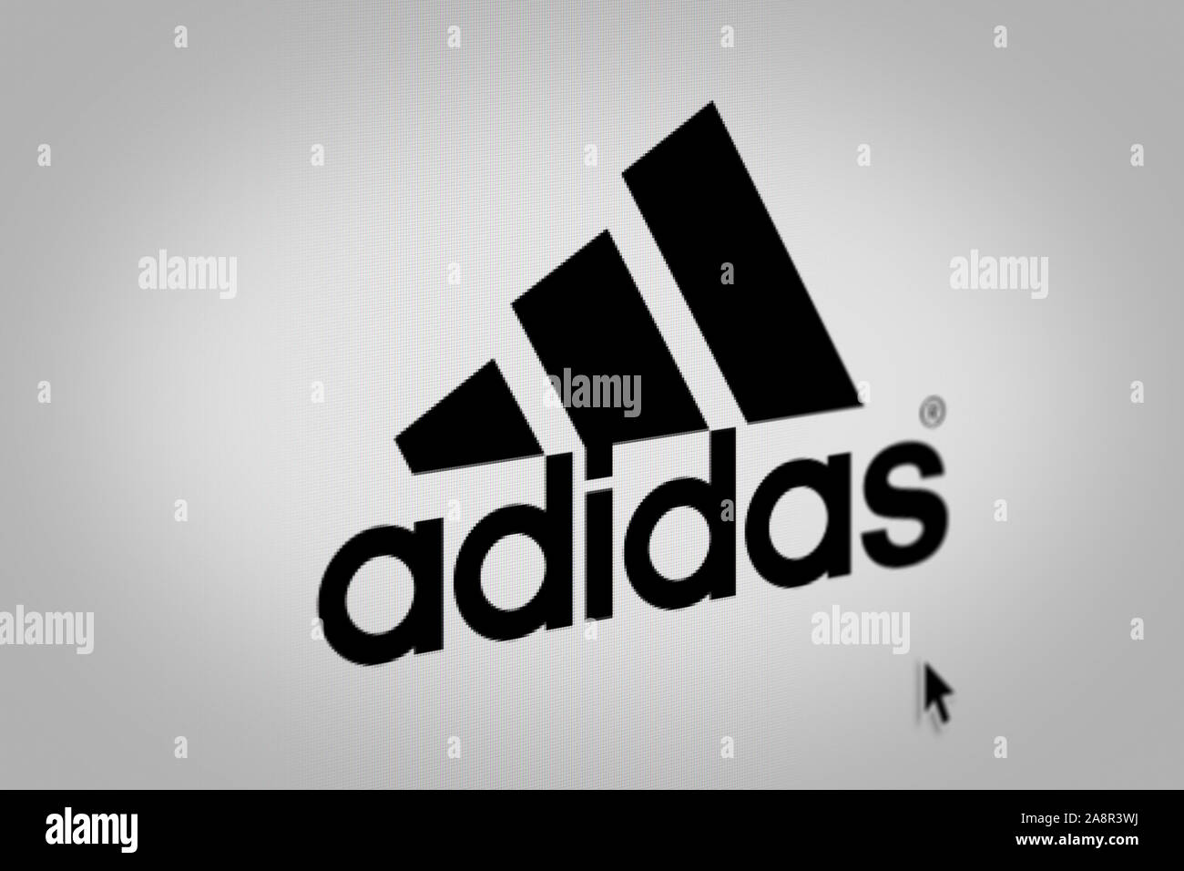 Logo of the public company Adidas displayed on a computer screen in  close-up. Credit: PIXDUCE Stock Photo - Alamy