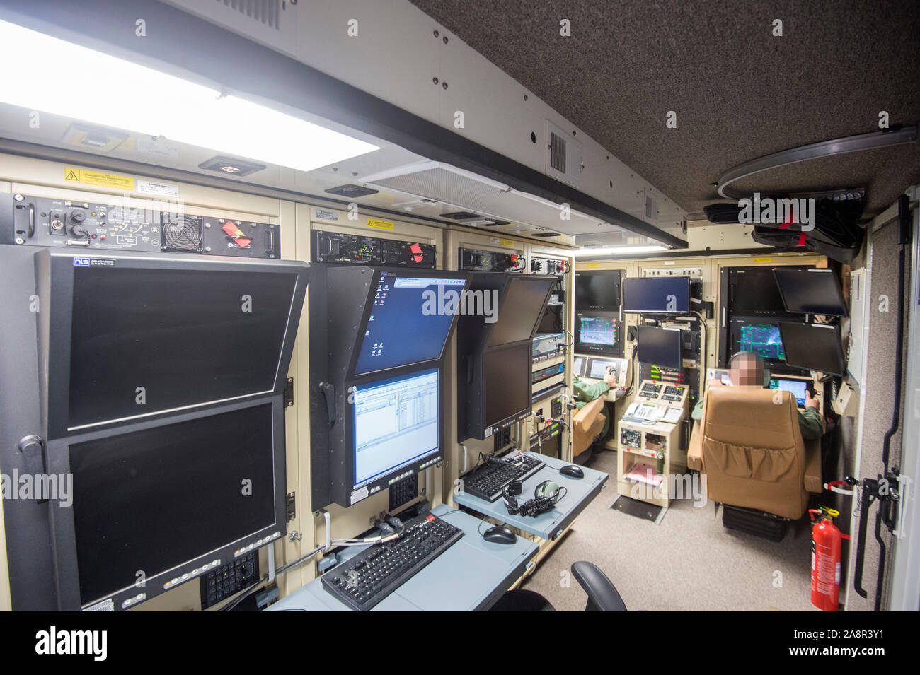 Pilots view in the high security Aircraft Hangar at RAF Waddington in Lincolnshire where Pilots seated behind banks of screens in an air-conditioned cabin,  use satellite links to control  unmanned 'Reaper' drone aircraft flying nearly constant armed reconnaissance missions over Iraq and Syria. November 2015 Stock Photo