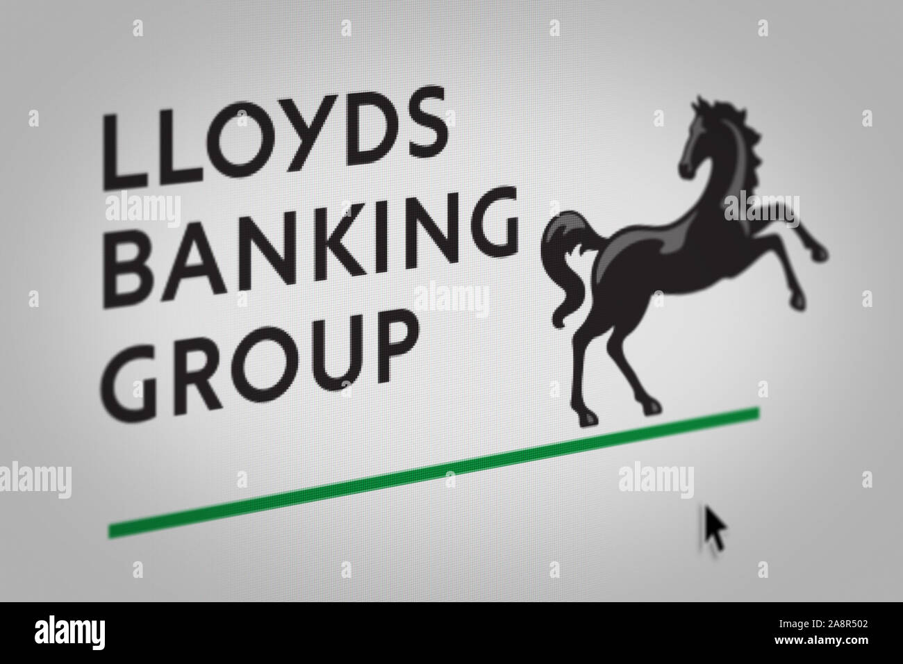 Logo of the public company Lloyds Banking Group displayed on a computer screen in close-up. Credit: PIXDUCE Stock Photo