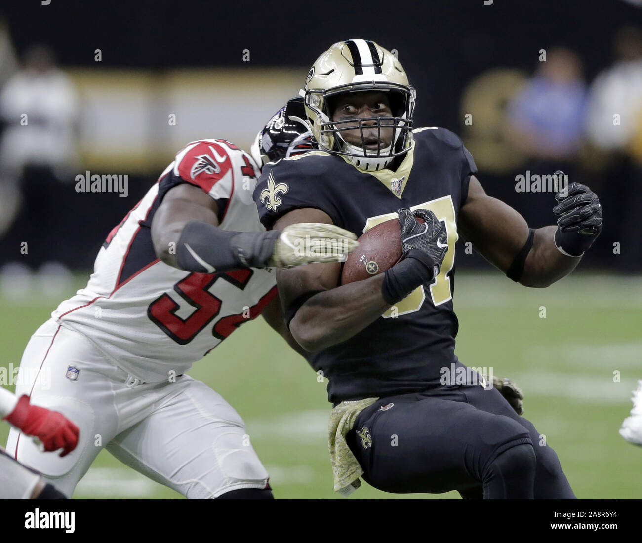 New Orleans, USA. 10th Nov, 2019. Atlanta Falcons linebacker Foye Oluokun (54) tackles New Orleans Saints tight end Jared Cook (87) at the Mercedes-Benz Superdome in New Orleans on Sunday, November 10, 2019. Photo by AJ Sisco/UPI Credit: UPI/Alamy Live News Stock Photo