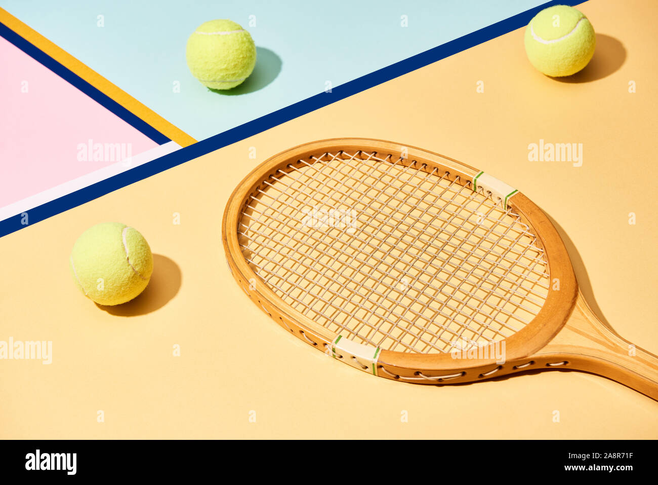 Wooden tennis racket and balls on background with blue lines Stock ...