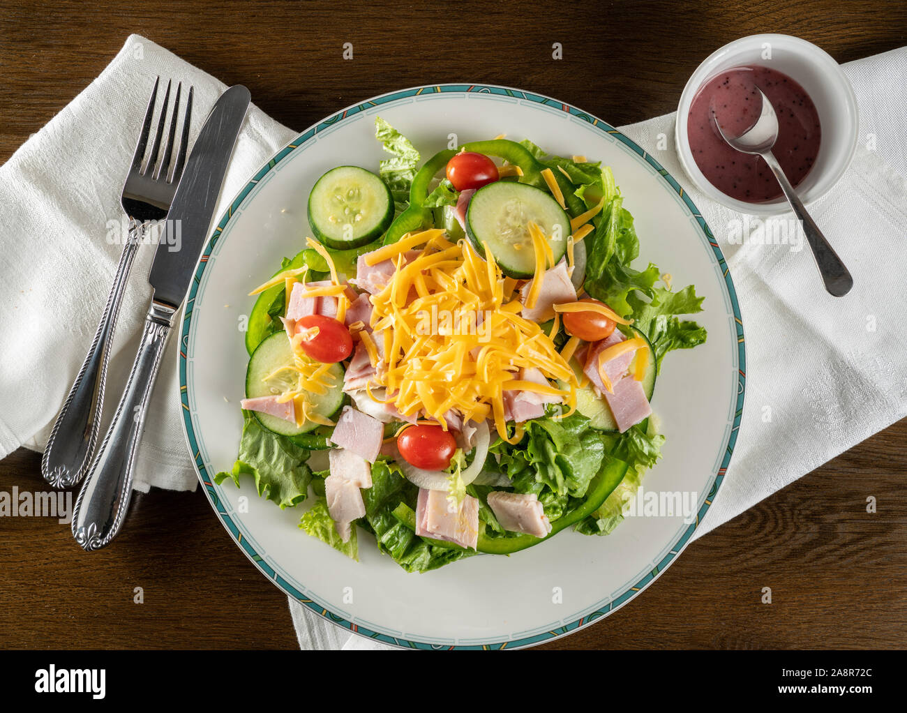 From above view of house or chef salad takeout food plated at home with napkin Stock Photo