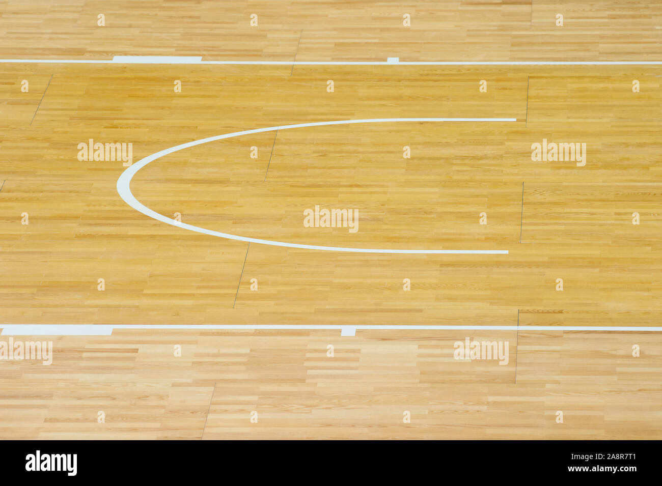 wooden floor volleyball, basketball, badminton, futsal, handball court with light effect Wooden floor of sports hall with marking lines line on wooden Stock Photo