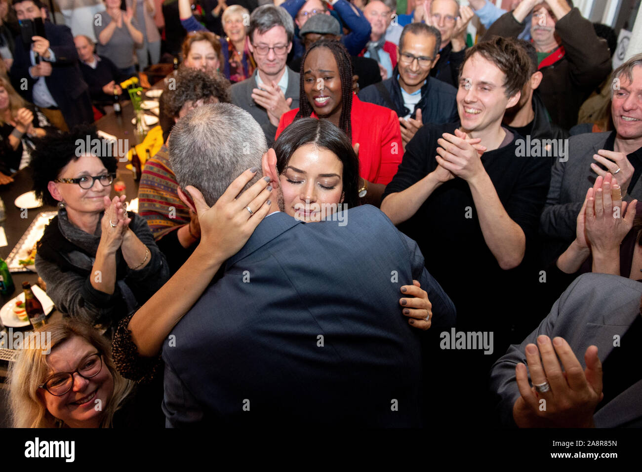 Hanover, Germany. 10th Nov, 2019. Belit Onay (Bündnis 90/Die Grünen), top candidate in the mayoral election, embraces his wife Derya among his supporters after the announcement of the election results. Since none of the ten candidates received more than 50 percent of the votes in the first ballot on 27 October 2019, a run-off ballot was held. Credit: Hauke-Christian Dittrich/dpa/Alamy Live News Stock Photo