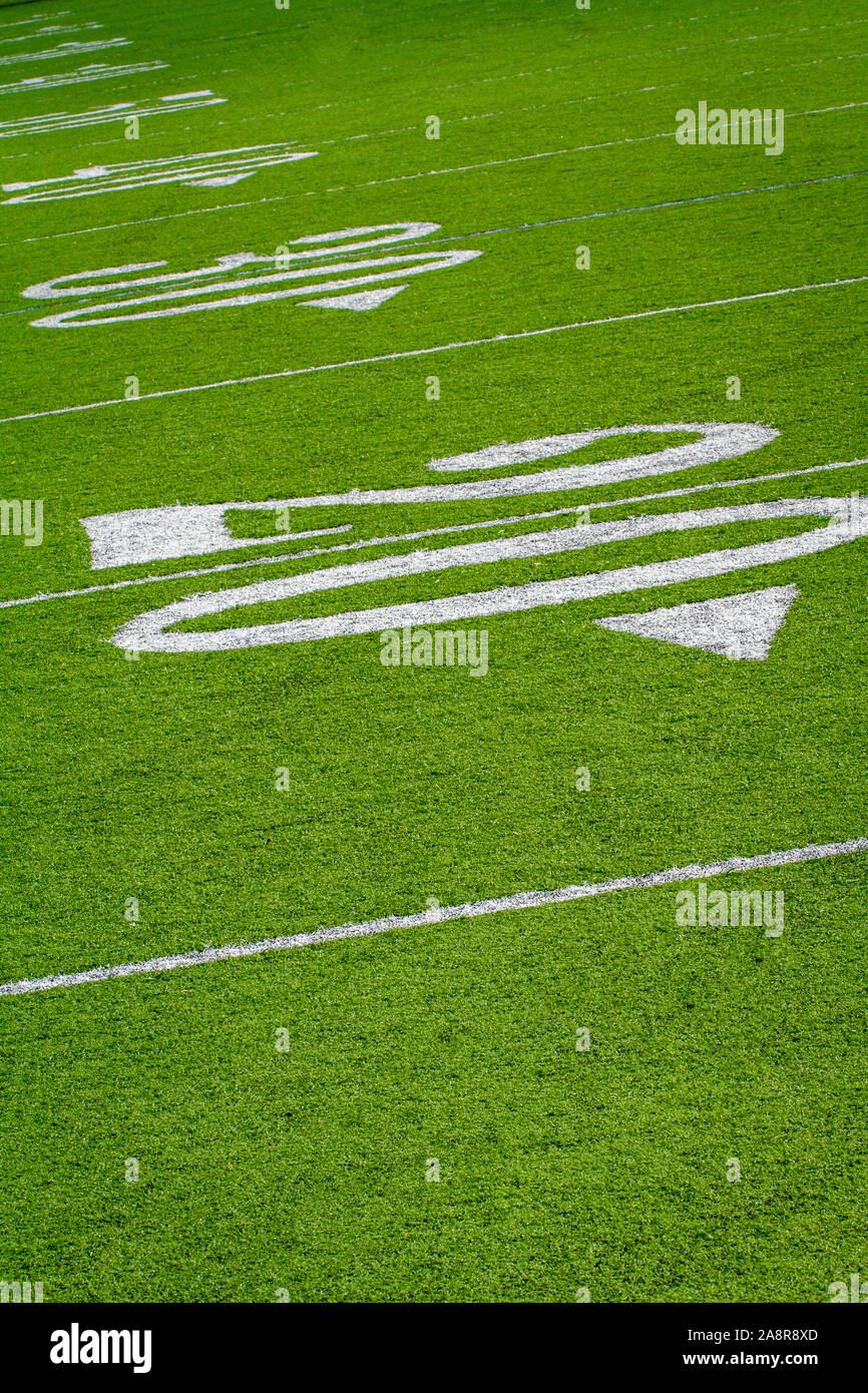 Twenty yard line of football field tillted at an angle Stock Photo Alamy